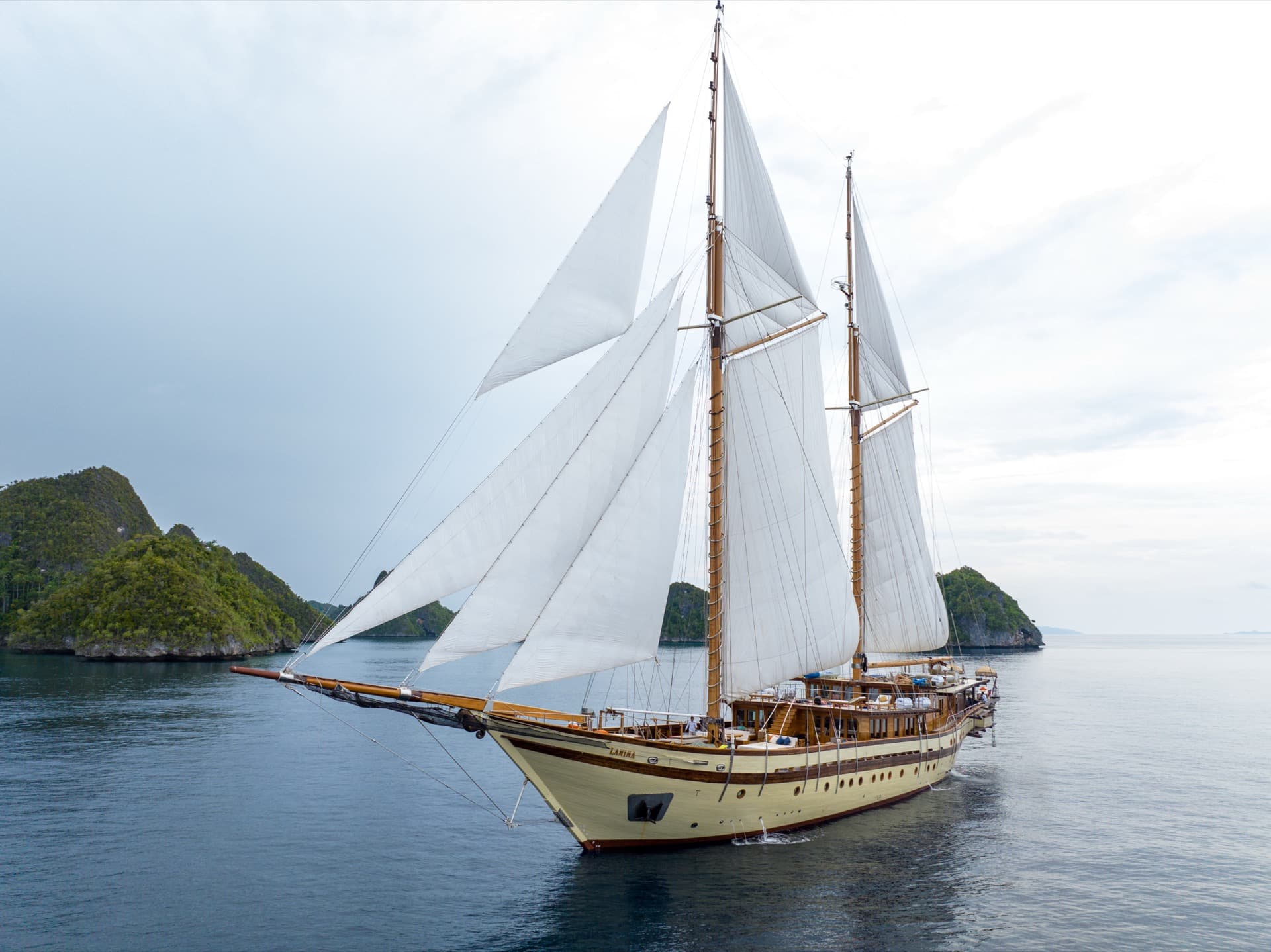 Lamima under full sail in Raja Ampat